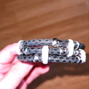 Black and silver bracelet with magnetic closure